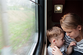 mother and son on train